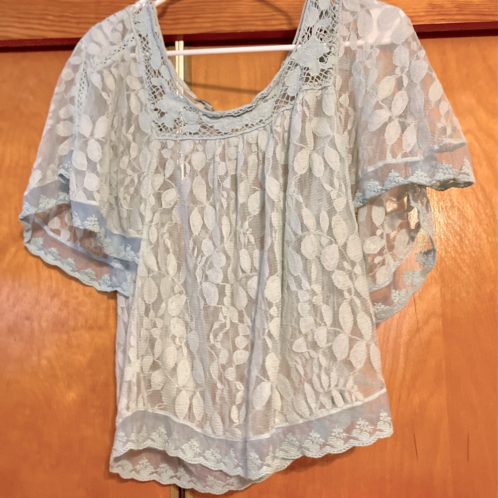 Charlotte Russe Light blue lace top with leaf detail